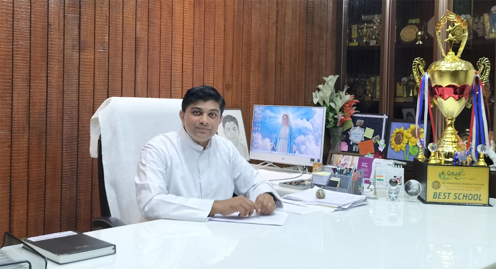 Principal Fr. Jinto Kallukaran CMI